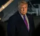 Trump delays Beijing trip as war continues