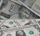 Rupee hits record low of 92.63 amid firm dollar, import pressures