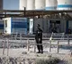 Iranian forces warn of broader retaliation if US targets its power facilities