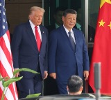 Ahead of China visit, Trump stresses ties and rivalry