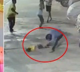 Man Picks Up 4 Year Old By Legs Slams Head On Road Over Fight With Father