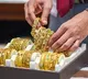 Gold slips 17 pc from record high despite war tensions