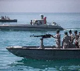 Iran's IRGC says hit Israel-linked vessel, ship ablaze