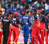 Sherfane Rutherfords Heroic Effort in Vain RCB Thrashes Mumbai