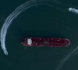 Two ships transit Hormuz for Iranian ports despite US blockade says Report