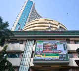Sensex, Nifty end off highs as bank, auto stocks drag