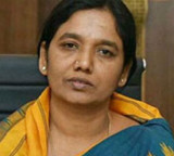 Paritala Sunitha Distributes Land Passbooks Sewing Machines to Farmers Women