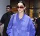 Mom-to-be Deepika Padukone repeats her oversized airport look as she returns to Mumbai after King shoot