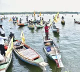 Nara Lokesh Welcomes Fishermen on 100 Boats at Krishna River
