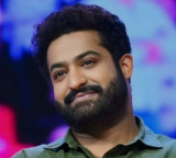 Jr NTR Fans Chant CM Slogans at Dragon Glimpse Screening