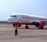 Air India flight lands amid 'full emergency' at Delhi airport over engine fire indication