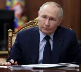 Putin signs law permitting use of army to protect Russians abroad