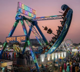 Rajgir Fair Tragedy Youth Dies After Fall From Tsunami Swing