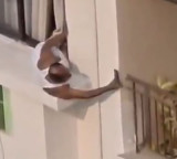 Elderly man caught secretly videotaping neighbors flat risking his life