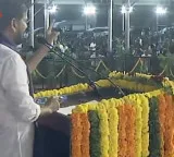 Revanth Reddy ignores heavy rain to distribute buses to women groups