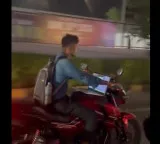 Working on laptop while riding a bike Sajjanar warns by sharing video