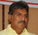 Kesineni Nani booked under IT Act for social media posts against brother Chinni