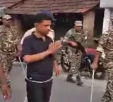 TMC leader paraded barefoot in shorts by police video goes viral