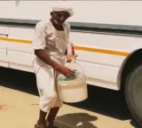 Thana Ram serving free water to travelers in Rajasthan for 21 years