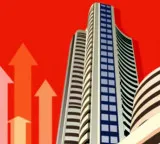 Indian markets trade flat in early deals amid mixed global cues