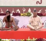 Chandrababu Naidu practices yoga with Baba Ramdev in Vijayawada