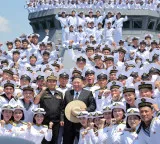 North Korea's Supreme Leader Kim Jong-un oversees artillery, missile tests