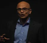 Satya Nadella warns companies are paying twice for AI