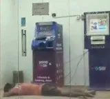 Man sleeping in SBI ATM due to heat viral on social media