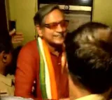 Shashi Tharoor stuck in lift for half an hour Rescue team uses hydraulic spreader to open doors