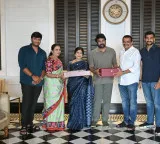 Bandla Ganesh gives wedding card to Chiranjeevi here are the photos