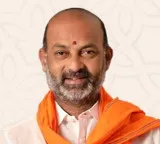 Bandi Sanjay calls Rahul Gandhi and Revanth Reddy protests political dramas