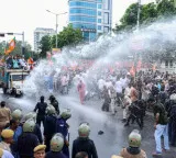 Raj police use water cannons to stop protestors as BJP marches to Congress HQ; INC announces counter-march