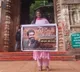Young woman displays Peddi poster on Tirupati Alipiri path drawing severe criticism