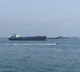 Iran stops three oil tankers in Hormuz as US strikes continue