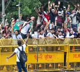 Cockroach Janata Party CJP protest victory as Education Minister Dharmendra Pradhan resigns