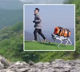 Unitree AS2 Robot Dog carries luggage and climbs mountains during trips