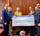 LIC MD R Doraiswamy presents dividend check to Nirmala Sitharaman