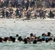 60000 migrants surge into Spain and return within hours