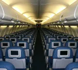 Why must airplane seats be upright during takeoff and landing