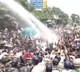 Jharkhand students break barricades and face water cannons in paper leak protest