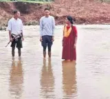 Andhra Pradesh teacher survives after being washed away in stream
