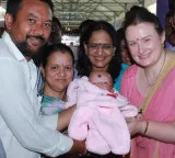 Anna Konidela spiritual tour and naming a baby in Draksharamam photos