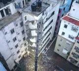 HYDRA demolishes dangerous building in Gachibowli with Baahubali JCB