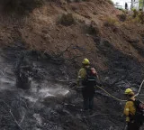 Fast-growing wildfire near US Nevada-California border injures 6, forces 42,000 to evacuate