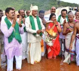 Chandrababu Naidu performs Jala Harathi and prostrates to Godavari waters photos here