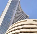Stock markets end in gains and small caps hit lifetime highs