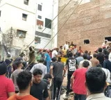 Five story building collapses in Delhi one dead