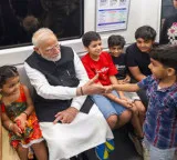 'I want to become like you': Boy whispers into PM Modi's ear during Delhi Metro ride