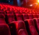 Why do movie theater seats automatically flip up