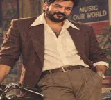 Revanth Reddy in 80s trend dashing look with Yamaha bike